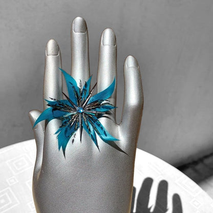 Bague Fidji en plumes bleu turquoise